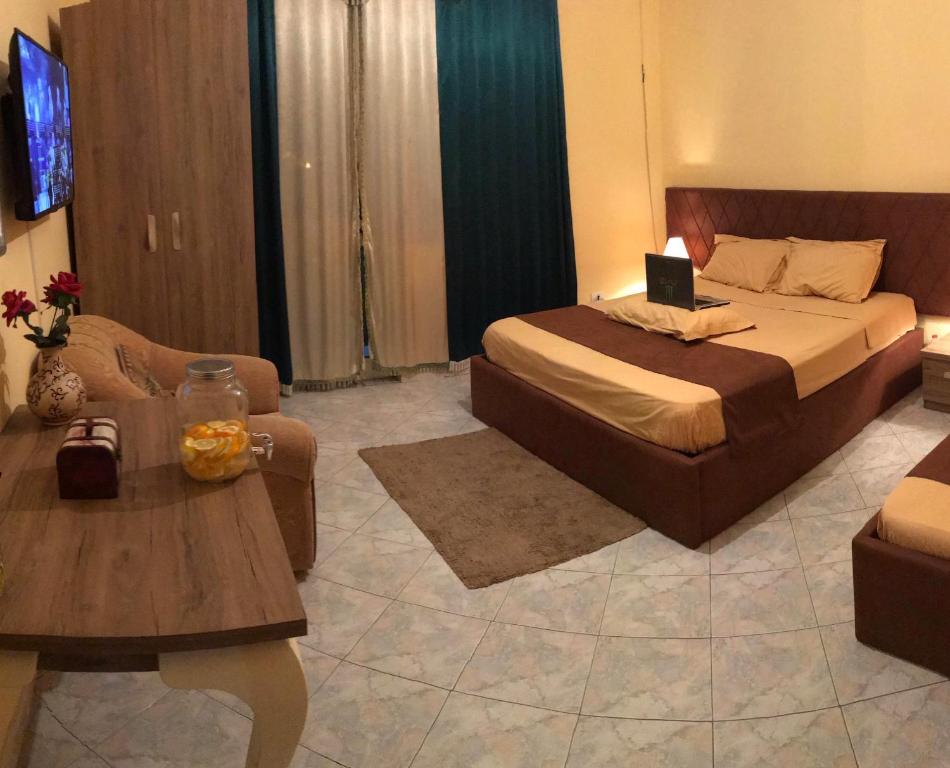 Vogli’s House Apartments & Rooms